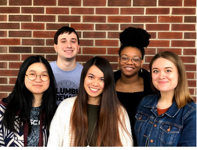 five smiling student research assistants